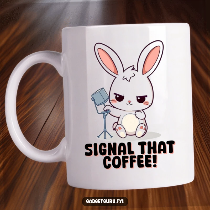 Funny rabbit mug showing a determined cartoon rabbit adjusting a miniature satellite dish, a humorous gift for tech lovers.