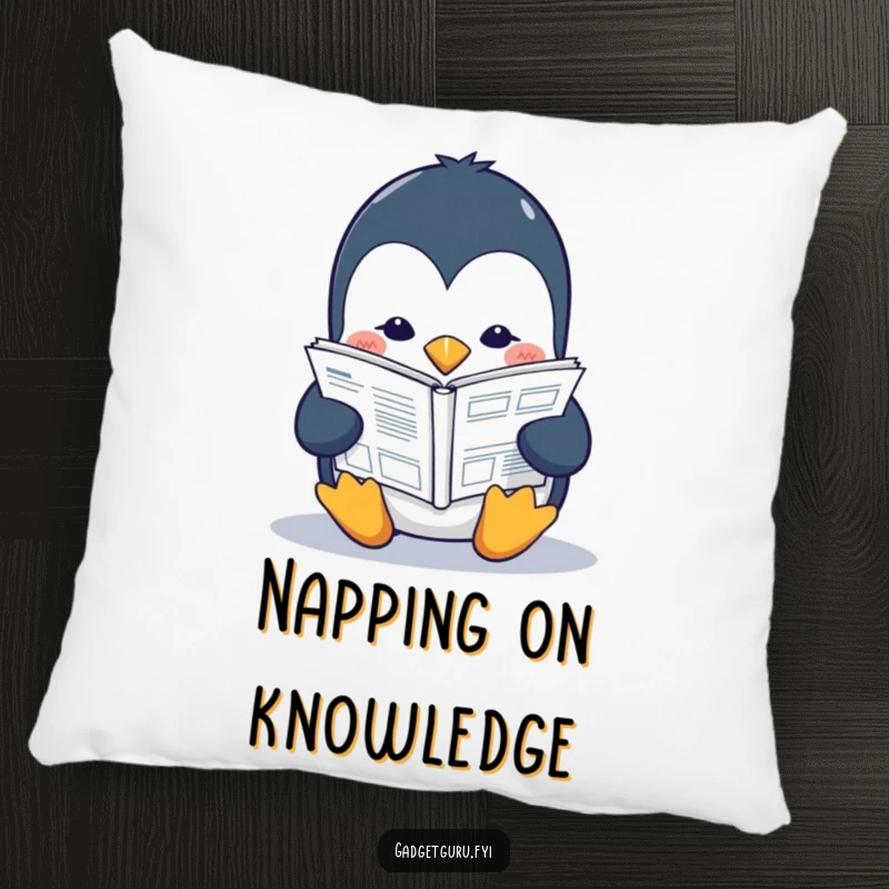 Funny penguin pillow featuring a studious character intently reading a small tech manual, combining comfort with a humorous theme.