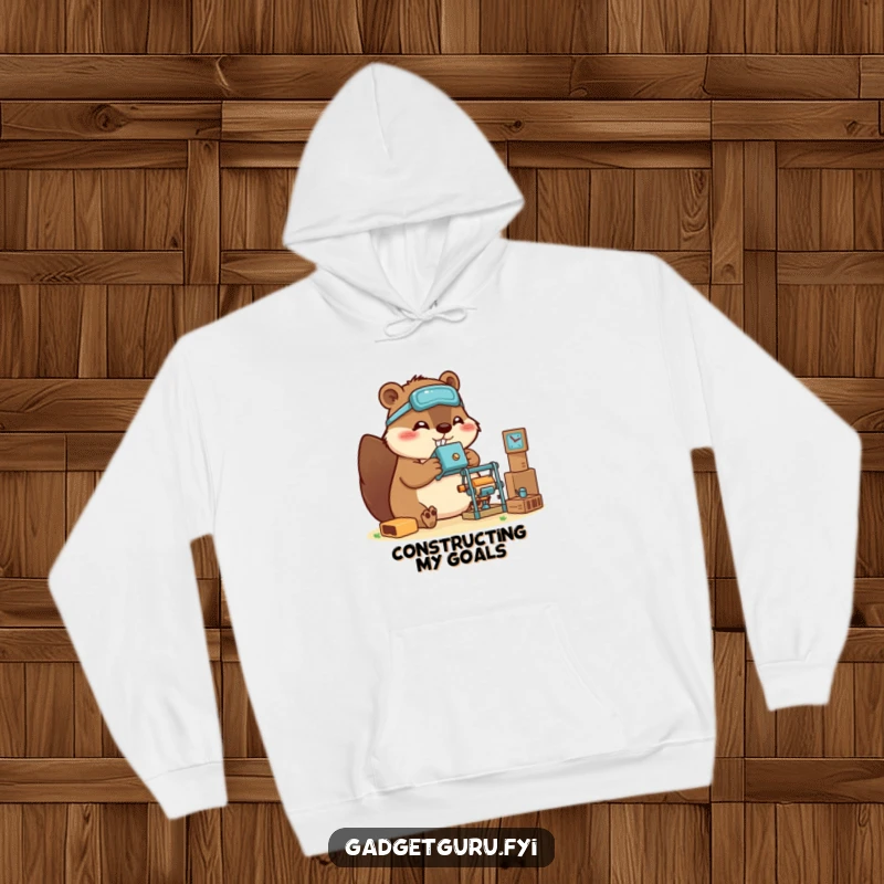 Funny beaver hoodie featuring a happy, crafty character assembling a miniature gadget, perfect for makers and builders.