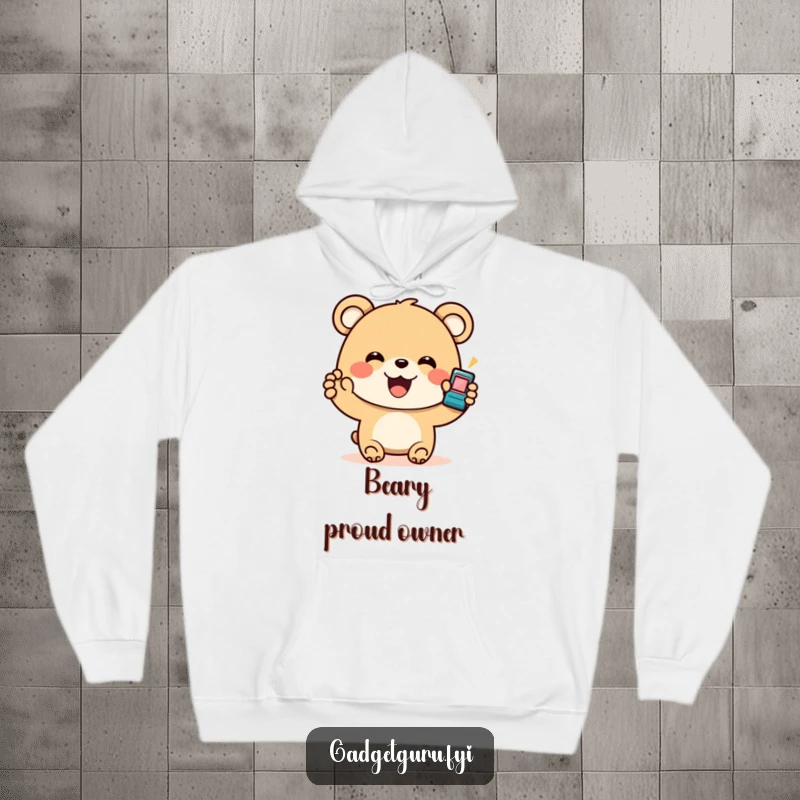 Funny Bear Gadget Hoodie: A warm hoodie depicting a happy bear holding a small, flashing gadget, perfect for tech enthusiasts seeking comfort.