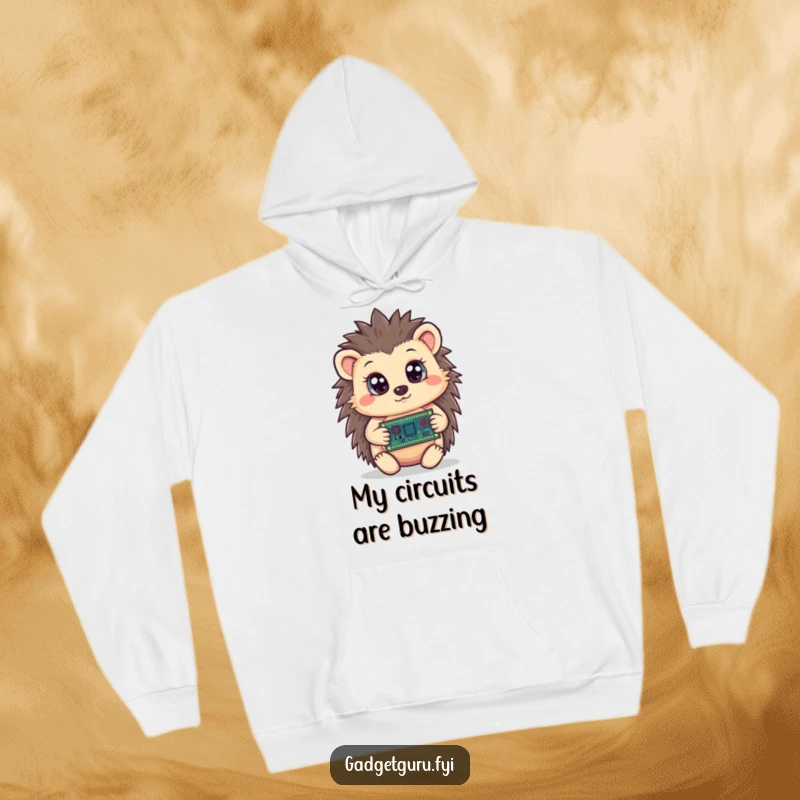 Funny hedgehog hoodie displaying a curious character holding a tiny circuit board with wide eyes, perfect for cozy, humorous tech wear.