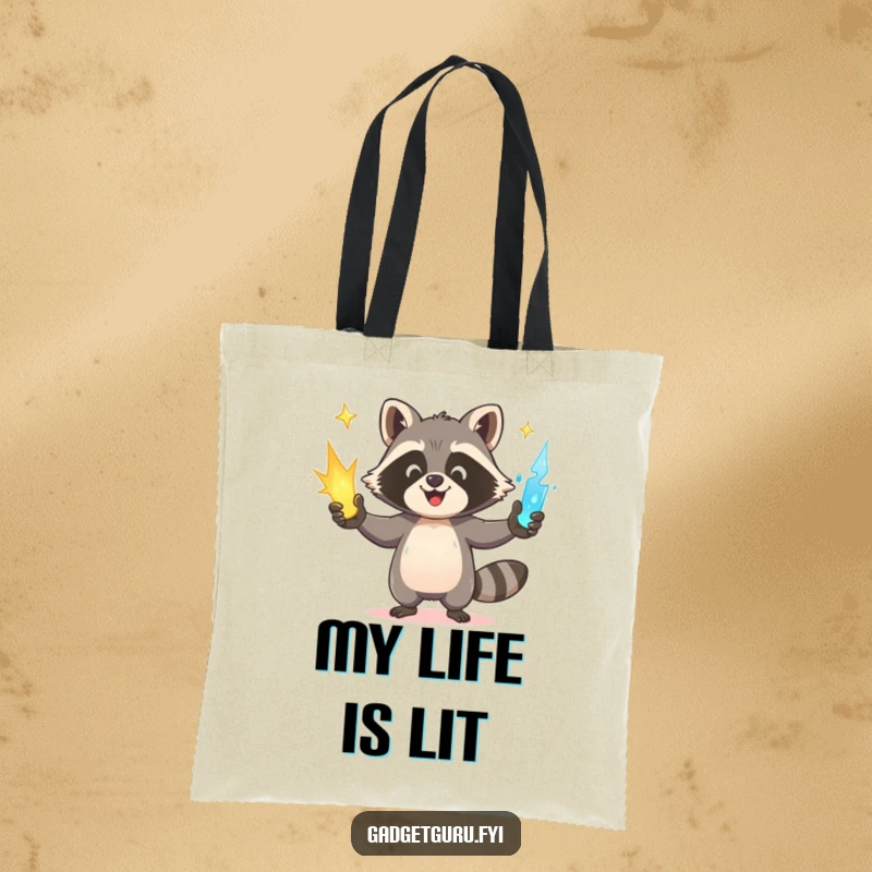 Funny Raccoon Tote Bag: A happy raccoon juggles three glowing power sources, perfect for carrying everyday essentials.